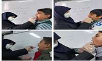 اجرای برنامه کشوری ارتقای سلامت دهان و دندان و وارنیش تراپی و فلوراید تراپی دانش آموزان پایه دبستان مدارس مرکز روستایی هیو